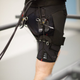 A system of actuation wires attached to the back of the exosuit provides assistive force to the hip joint during running. (Credit: The Wyss Institute at Harvard University)